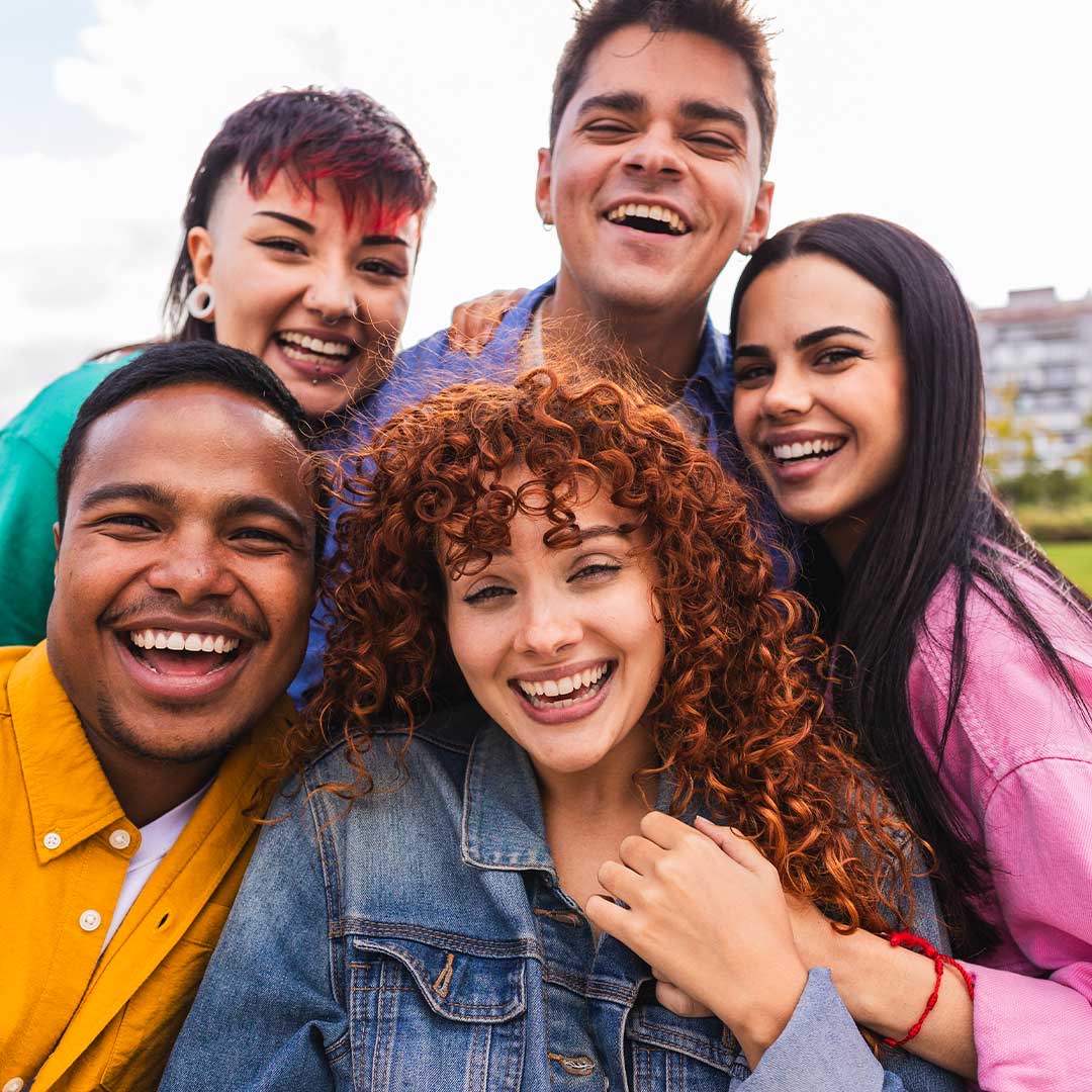 Shot of a couple spending time outdoors with their two children